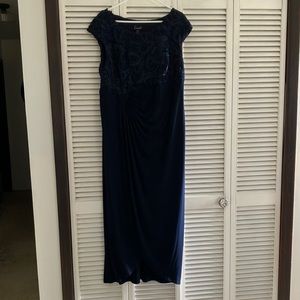 Women’s formal dress size 18 W, rich navy blue with embellished top.